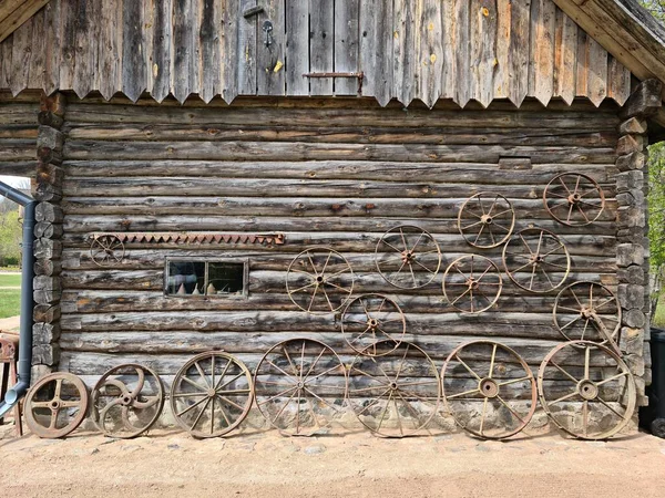 Many Wooden Metal Wheels Old Carts Hung Wall Wooden Barn — Stock Photo, Image