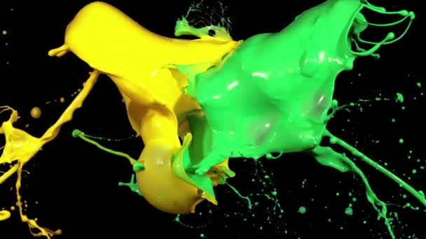 Splashes of multicolored paint in macro photography — стоковое видео