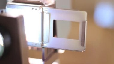 Vintage slide holder. A 19th-century projector.