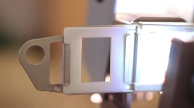 Vintage slide holder. A 19th-century projector.