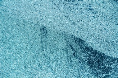 Buz dokusu arka planı. Mavi ve soğuk renklerin tüm tonları.