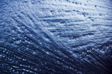 Buz dokusu arka planı. Mavi ve soğuk renklerin tüm tonları.