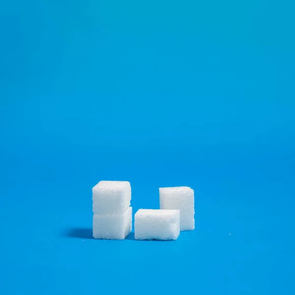 Cubos Açúcar Fundo Azul — Fotografia de Stock