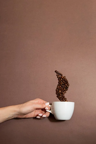Cup Hot Coffee Coffee Beans Look Smoke Brown Background — Zdjęcie stockowe