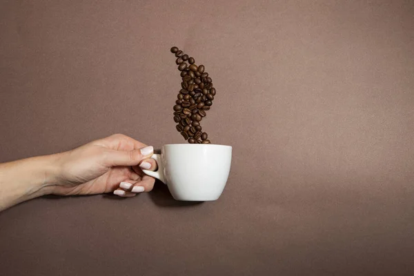 Cup Hot Coffee Coffee Beans Look Smoke Brown Background — Fotografia de Stock