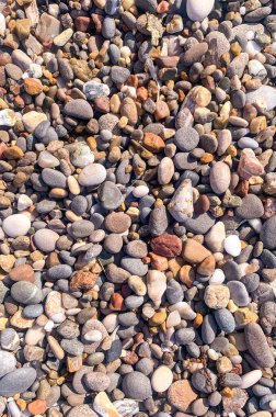 Arkaplan, doku, yuvarlak doğal taştan duvar.