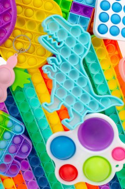 Farklı basit gamzeler, patlat. Çocuklar ve yetişkinler için modaya uygun ve modern stres önleyici oyuncaklar.