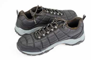 Beyaz arka planda siyah spor izole ayakkabılar. Stüdyo Fotoğrafı.