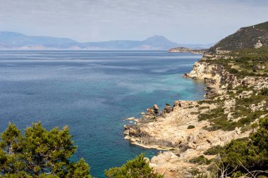 Beautiful panoramic view of the mountains and sea in the distance on a sunny summer day (prefecture of Corinthia, Greece).