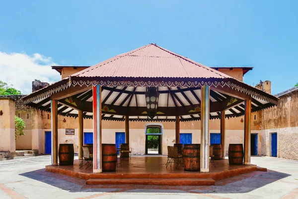 Bar in the courtyard of the hotel with a prison library on the prison island. Zanzibar