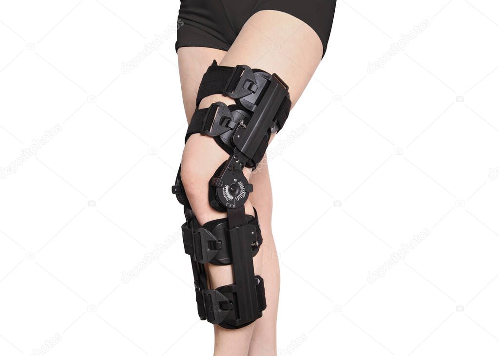 knee brace on a woman's leg on a white background
