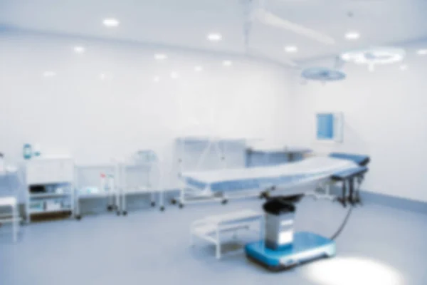 Salle d'opération intérieure vide floue et équipement moderne à l'hôpital. Dispositif médical pour chirurgien patient chirurgical d'urgence dans un style bleu. — Photo