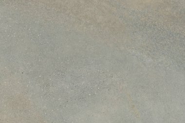 Doğal taş dokusu. Gri mermer, mat yüzey, İtalyan levhası, granit, fildişi deseni, seramik duvar ve zemin fayansları. Kırsal doğal porselen taş kaplama arka plan yüksek çözünürlüklü. Kireç taşı deseni