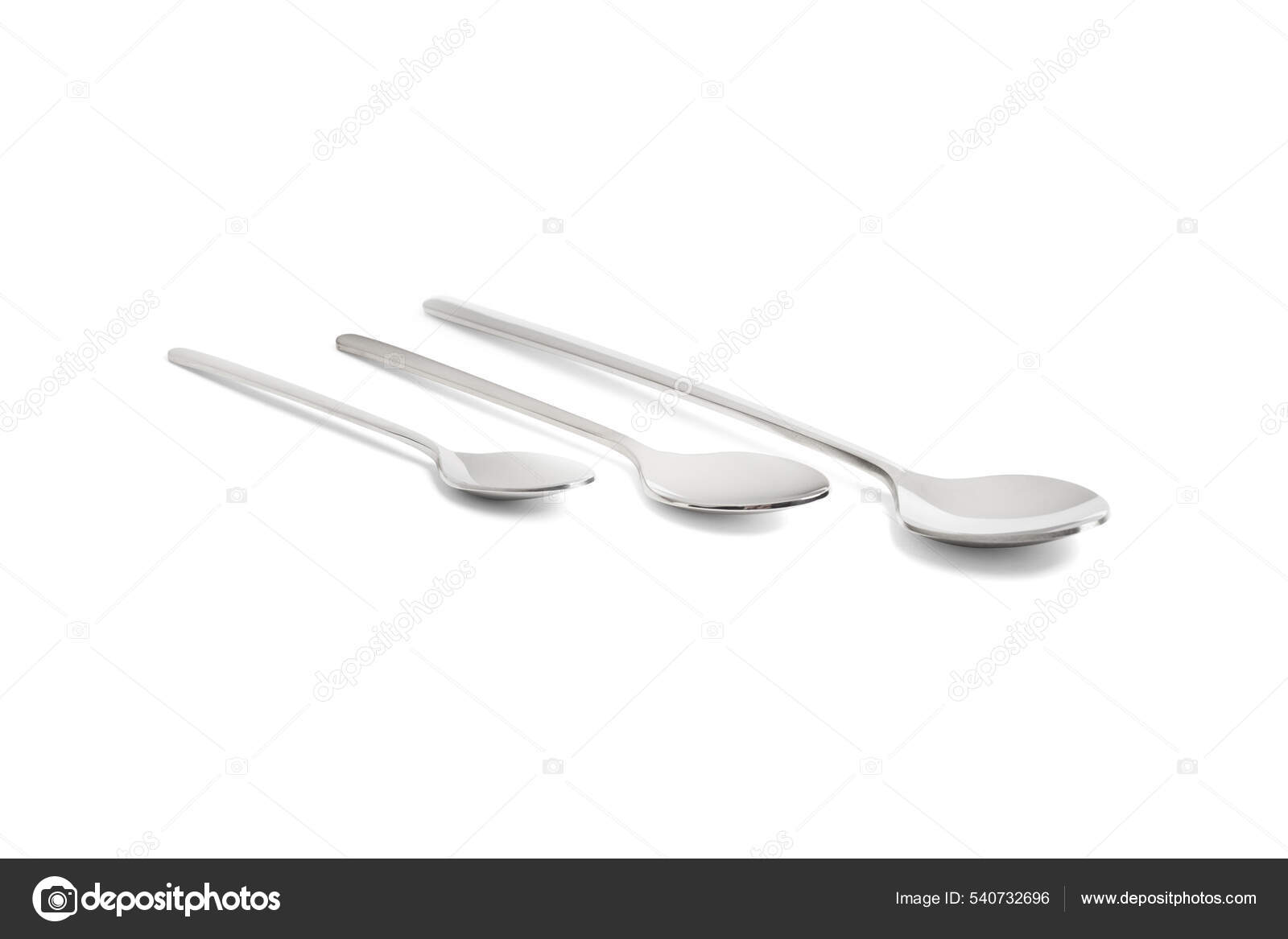 Clean shiny metal spoon isolated on white. Stainless steel small