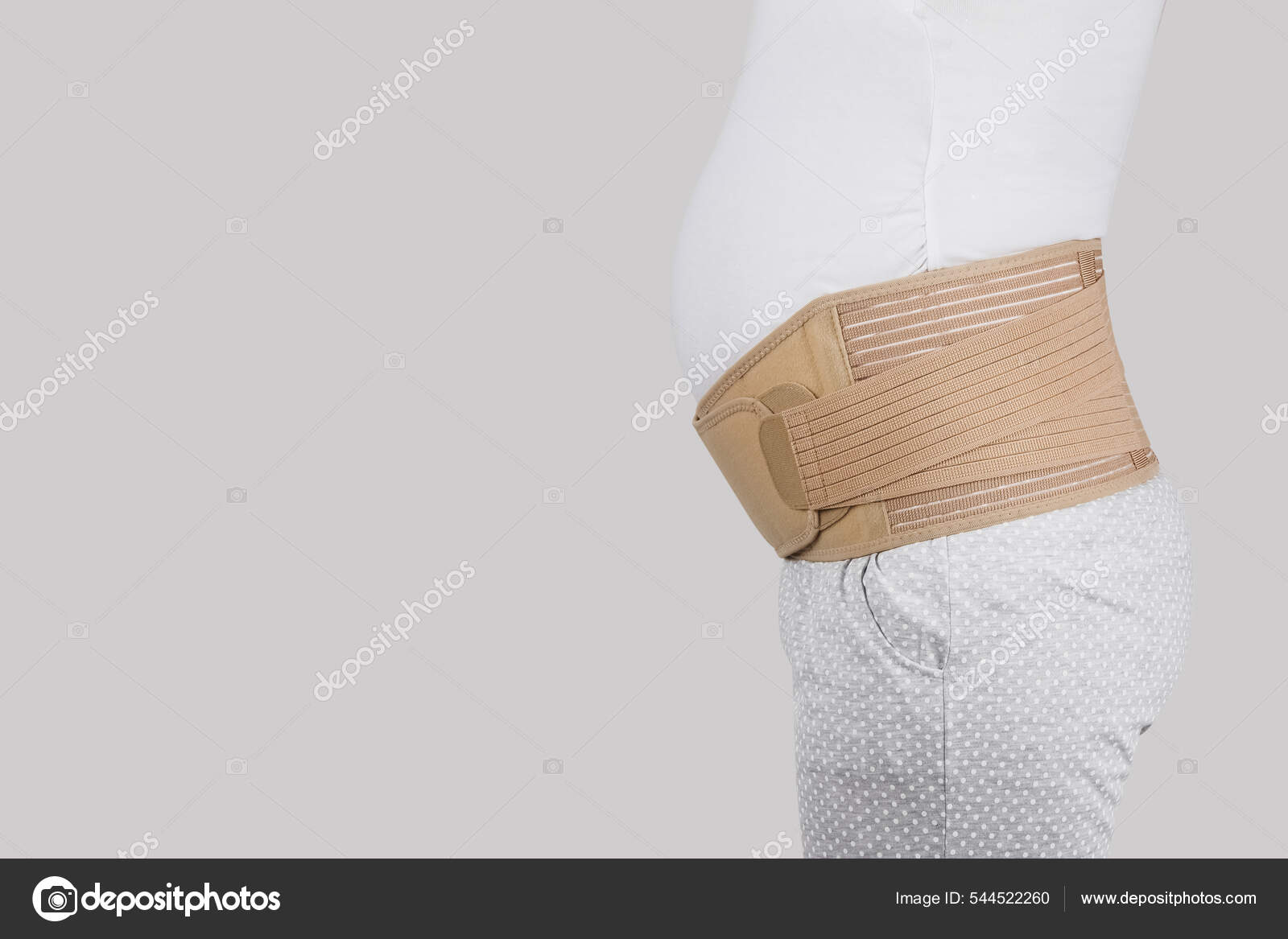 https://st.depositphotos.com/59770376/54452/i/1600/depositphotos_544522260-stock-photo-pregnant-woman-belly-in-prenatal.jpg