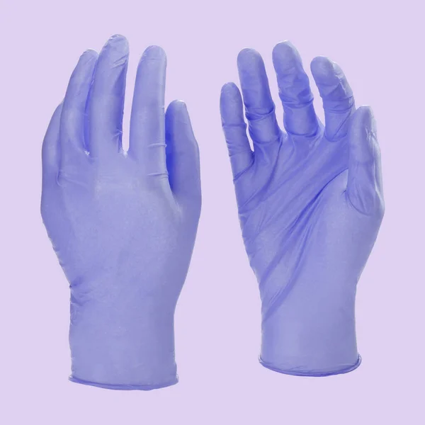 两只蓝色胶乳医用手套，白色背景，没有手 — 图库照片