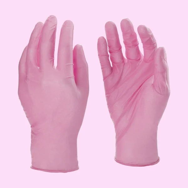 两只粉红色的医用手套，白色背景，没有手 — 图库照片
