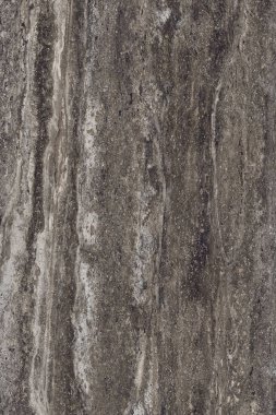 Doğal taş dokusu üst görünümü. Kahverengi mermer, mat yüzey, İtalyan levhası, granit, fildişi deseni, seramik duvar fayansları. Kırsal doğal porselen taş kaplama dikey arka plan. Kireç taşı deseni.