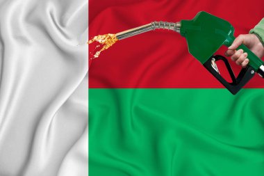 Yakıt pompası başlığı ile arka plan dokusunu sallarken MADAGASCAR bayrağı yakın çekim görüntüsü. Tasarım çözümleri kavramı. 3d oluşturma