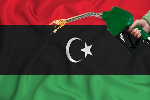 Libya Flagga Närbild Skott Viftande Bakgrundskonsistens Med Bränslepump Munstycke Handen — Stockfoto