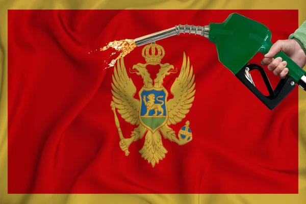 Montenegro Flagga Närbild Skott Viftande Bakgrundskonsistens Med Bränslepump Munstycke Handen — Stockfoto