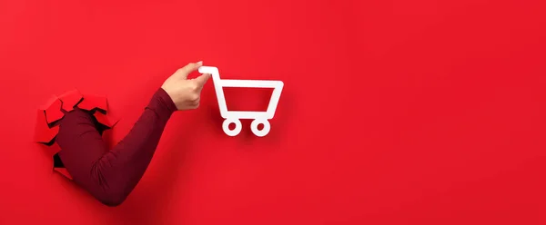 Shopping Cart Hand Red Background Panoramic Layout — Foto de Stock