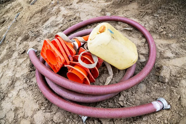 Construction Hose Water Canister Orange Cones Ground Again — Stockfoto