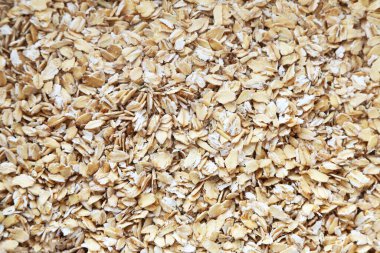 Oatmeal flakes texture background even layer