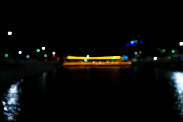 Abstrakta Bokeh Ljuseffekter Natten Svart Bakgrund Med Färgglada Ljuseffekter Bakgrund — Stockfoto