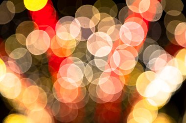 Soyut Bokeh ışık efektleri. Renkli ışık efektleriyle siyah arkaplan. Görüntü efektli arka plan. Soyut arkaplan dokusu  