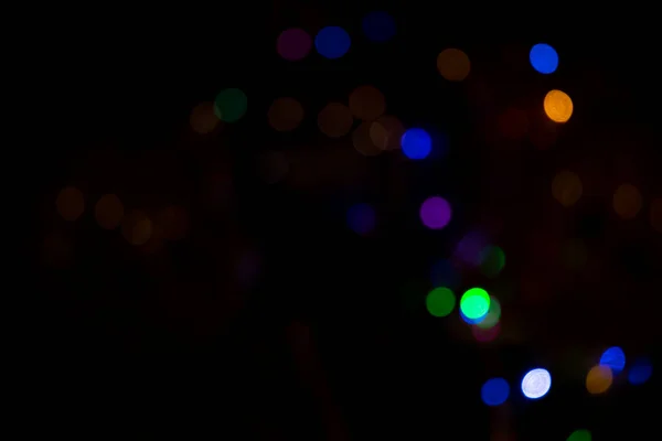 Abstracte Bokeh Licht Effecten Nacht Zwarte Achtergrond Met Kleurrijke Lichteffecten — Stockfoto