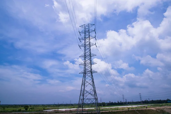 High Voltage Electricity Pylon Cloudy Blue Sky — стоковое фото