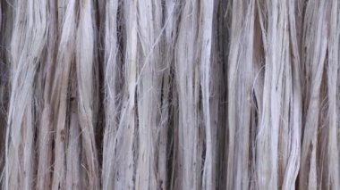 Close-up shot Hanging Raw jute fiber swings in the air