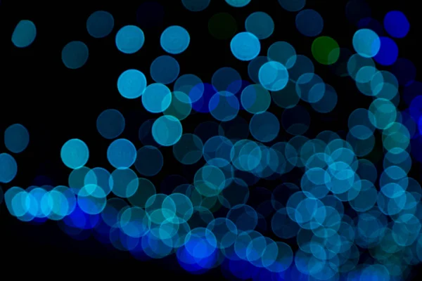 Blue Defocus Abstrakte Bokeh Lichteffekte Auf Dem Nächtlichen Schwarzen Hintergrund — Stockfoto