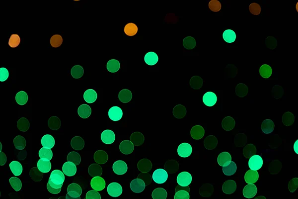 Grüne Defocus Abstrakte Bokeh Lichteffekte Auf Der Nachtschwarzen Hintergrundtextur — Stockfoto
