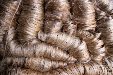 Kalın bir demet Altın kenevir iplik dokusu arka planı