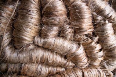 Kalın bir demet Altın kenevir iplik dokusu arka planı