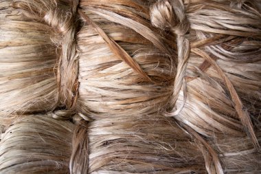 Kalın bir demet Altın kenevir iplik dokusu arka planı