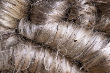 Kalın bir demet Altın kenevir iplik dokusu arka planı