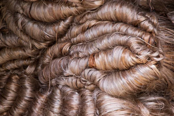 Kalın bir demet Altın kenevir iplik dokusu arka planı