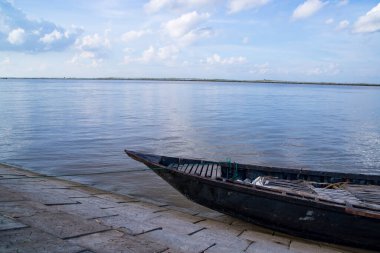 Beautiful Landscape View of wooden fishing boats on the bank of the Padma river in Bangladesh