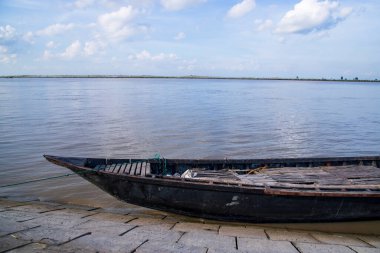Beautiful Landscape View of wooden fishing boats on the bank of the Padma river in Bangladesh