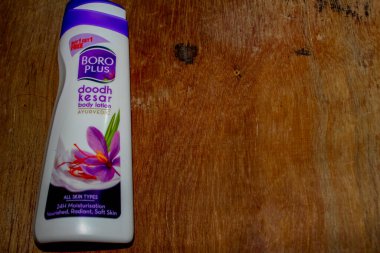 a cream for women, skin care, boro plus, space left for text