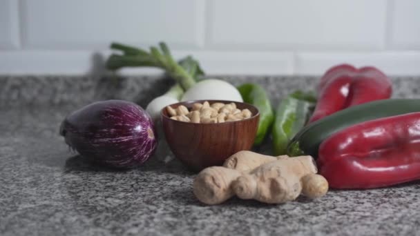 Colorful Vegetables With Bowl Of Cashow Nuts On Kitchen Countertop. 《 월 스트리트 저널 》 ( 영어 ). 판 라이트 — 비디오