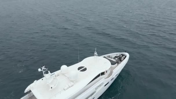 Luxury And Pleasure Motor Yacht Floating In The Sea Near Mallorca Island In Spain. - aerial orbit — стоковое видео
