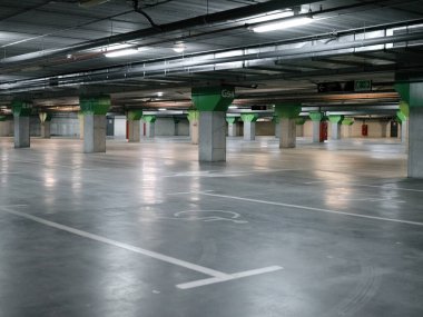 Public car park with handicapped markings on the ground