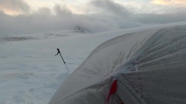 Tent during bad weather in winter mountains. Hike in the winter mountains. Carpathians. Borzhava.
