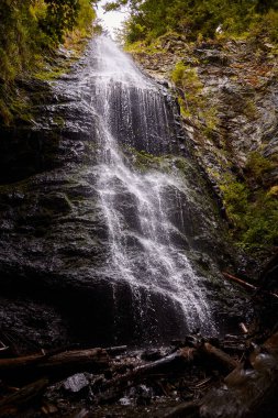 Yalynskiy waterfall in Marmaros region. Carpathian Mountain, Ukraine. Walking and hiking trails in Marmaros ridge. Rural area of carpathian mountains in autumn
