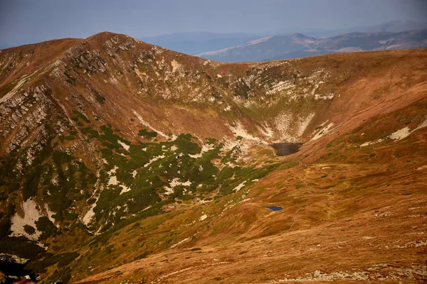 Brebeneskul lake. Carpathian Mountain, Ukraine. Walking and hiking trails in Chornohora ridge. Rural area of carpathian mountains in autumn