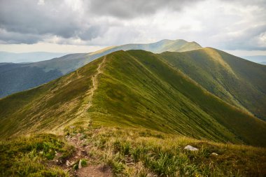 Mountain range. Carpathian Mountain, Ukraine. Walking and hiking trails in Borzhava ridge. Rural area of carpathian mountains in autumn